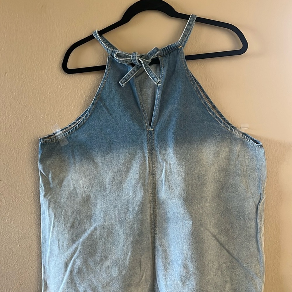 Denim razor back top. Ties in the back. 25” from top of neckline to hem.